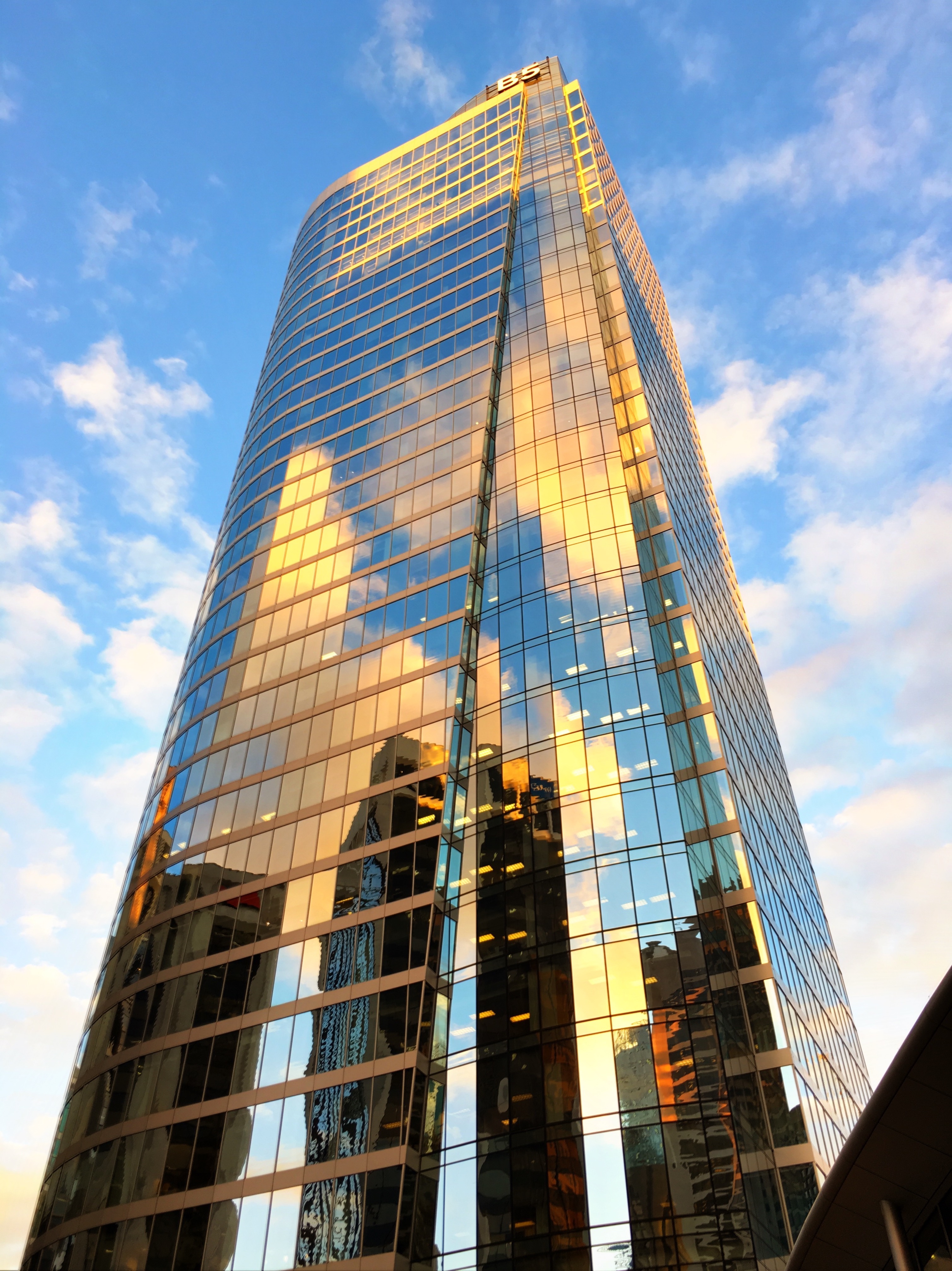 Building Skyscraper Glass Sky Clouds Bottom-view