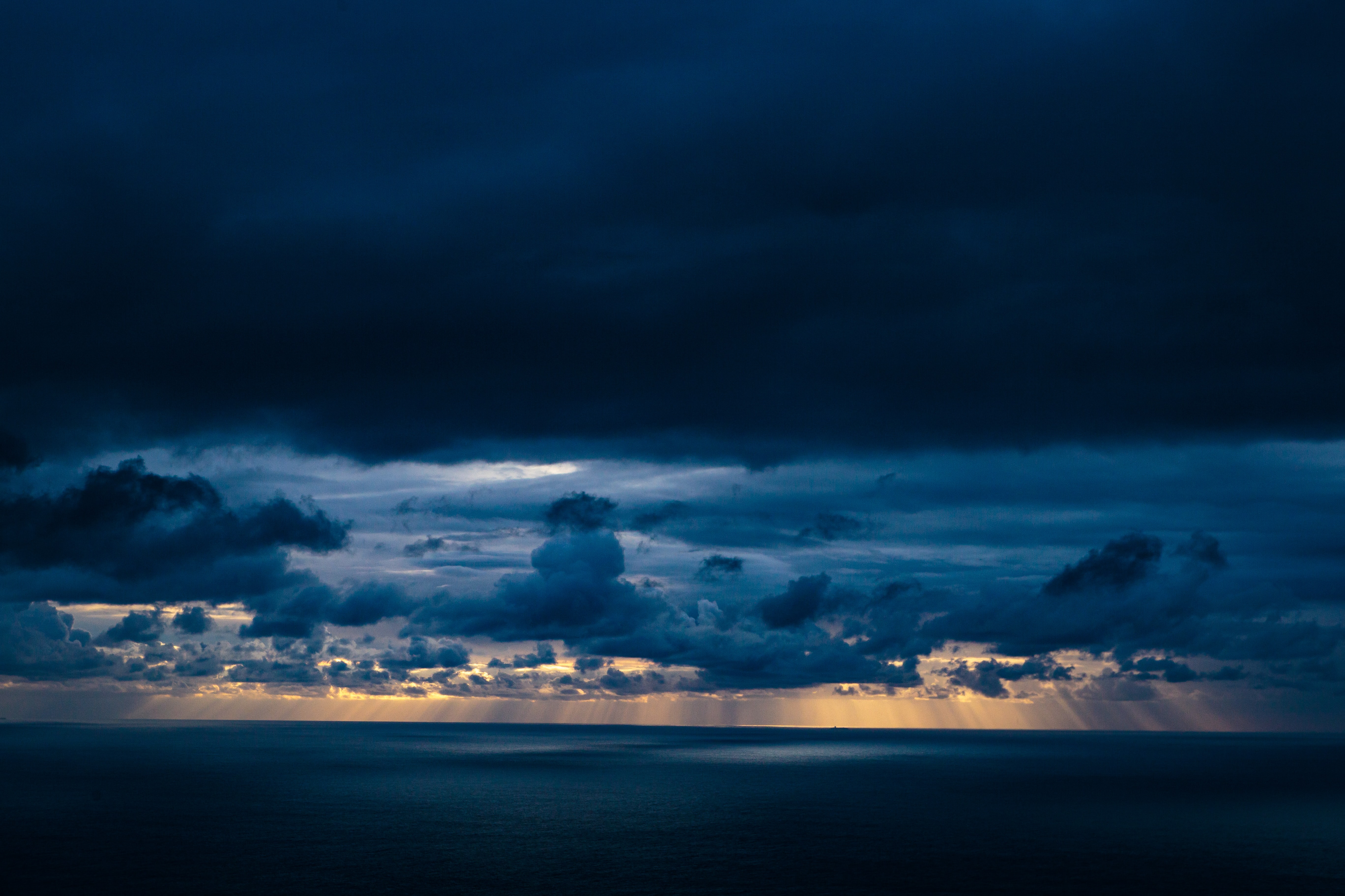 Clouds Sky Rays Sea Dark