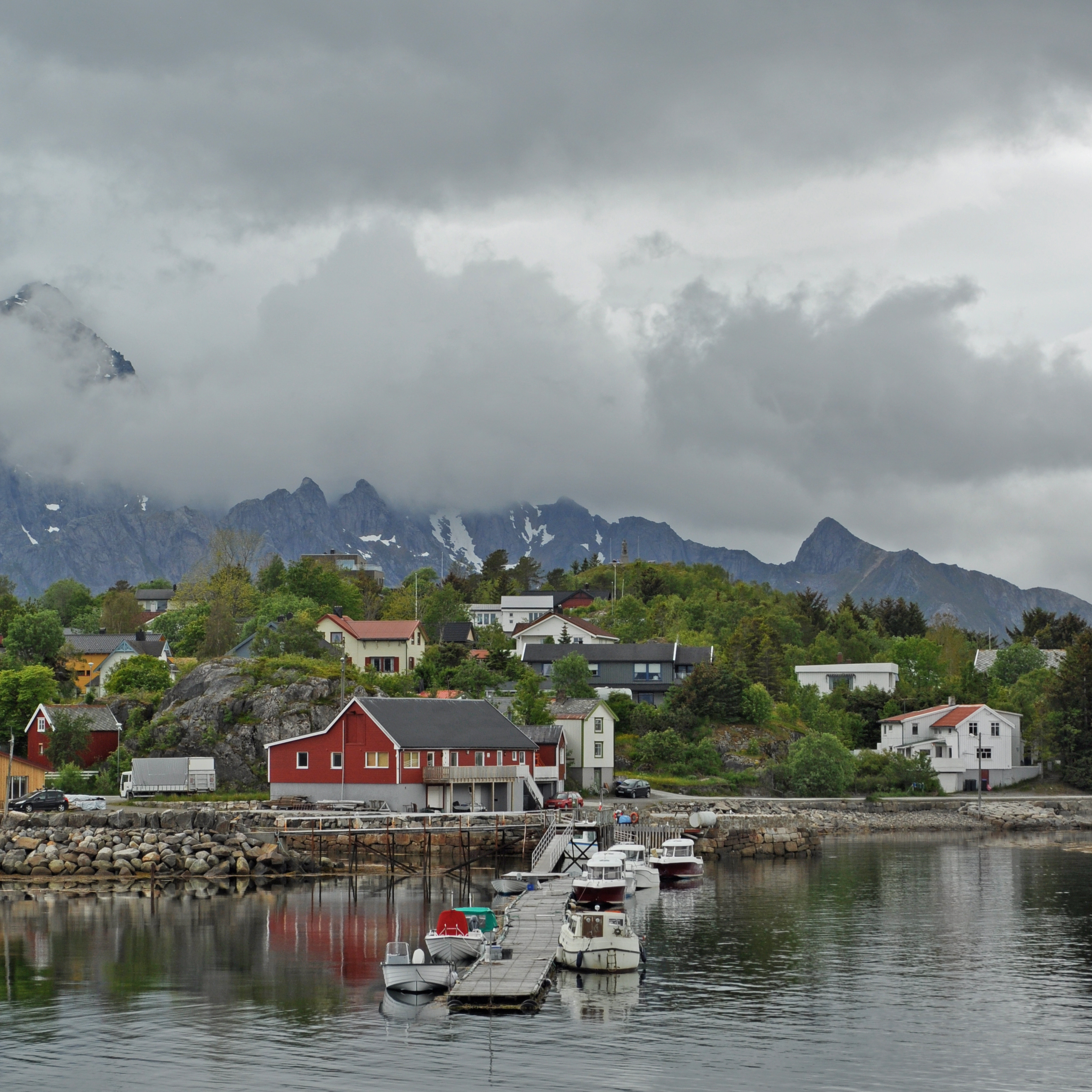 Village Buildings Coast Water Mountains Clouds